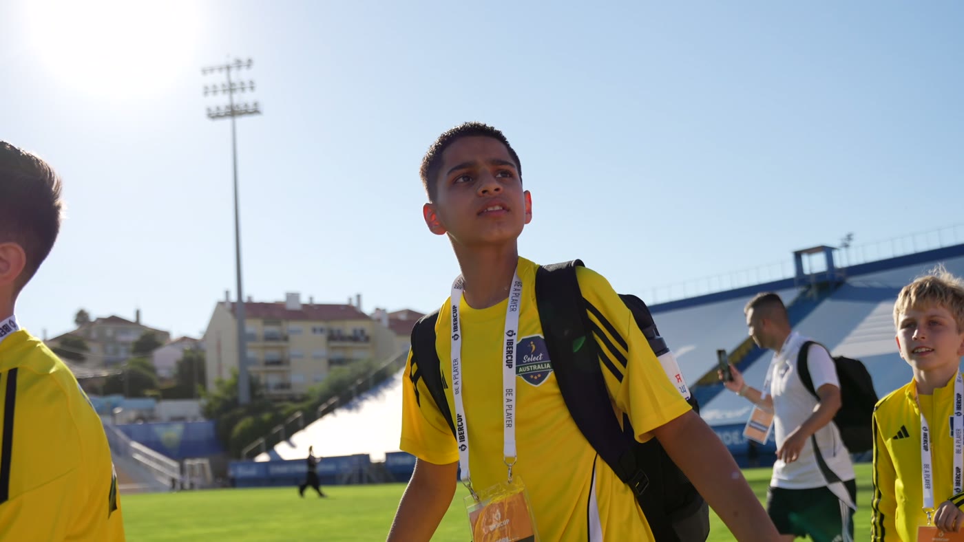 Select Australia player arriving at the stadium wearing the squad jersey and medal