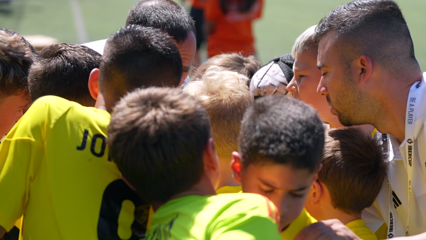 Team huddle with the coach before kick-off at IberCup